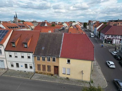 Mehrfamilienhaus mit stabilen Erträgen + weiterer Entwicklungsfläche