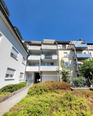 Zentral wohnen mit Balkon & Tiefgarage – 2-Zimmer-Wohnung mit Gestaltungsspielraum!
