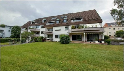 Attraktive 2-Zimmer-Wohnung mit Terrasse & Einbauküche  & Tiefgaragenstellplatz in zentraler Lage
