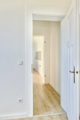 Wunderschöne, helle 2,5 Zimmerwohnung mit großem Gemeinschaftsgarten und Einbauküche