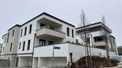 3-Zimmer-Neubauwohnung mit  Loggia, Fußbodenheizung und zwei Tiefgaragenstellplätze