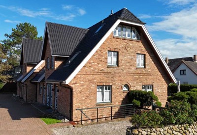 Neuwertige 2 ½-Zimmer-Maisonette-Ferienwohnung  mit Terrasse und Garten in strandnaher Lage