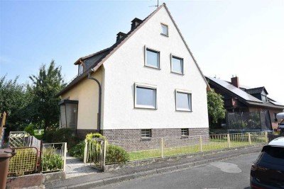 Ihr Familienglück in Baunatal-Großenritte – Ein Haus mit Herz und Garten zum Aufblühen