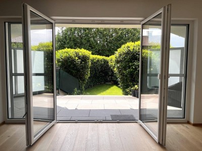 Bergheim: Moderne 3-Zimmer-Gartenwohnung mit überdachter Terrasse