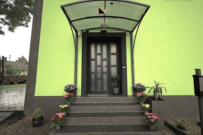 Alles im grünen Bereich – Neubau mit historischem Gewand