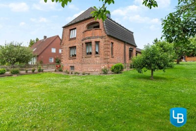 Zweifamilienhaus mit Weitblick: Natur, Garten & Seenähe vereint