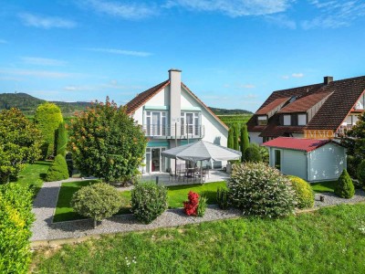 IMMORath.de - Exklusives Einfamilienhaus mit Gästebereich