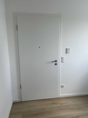 Erstbezug mit Balkon und EBK: Stilvolle 2-Raum-Erdgeschosswohnung mit geh. Innenausstattung in Unkel