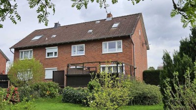 ideal für eine Familie: Doppelhaushälfte in Süderwisch, gepflegt, schnell beziehbar, Garage, Garten