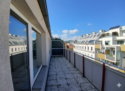 Helle Wohnung mit 31m² Terrasse im fünften Liftstock, großem grünen Gemeinschaftsgarten &amp; Fitnessraum