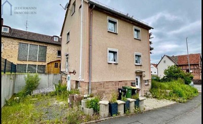 Kleines Einfamilienhaus mit Grundstück in Schauenburg!