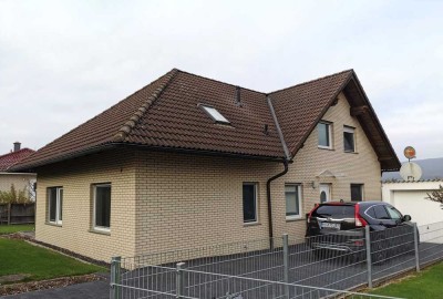 Zweifamilienhaus mit Gemüsegarten und vielseitigen Nutzungsmöglichkeiten