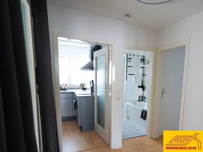 Zentral gelegene Dachgeschosswohnung mit Einbauküche - Für Berufspendler bestens geeignet!