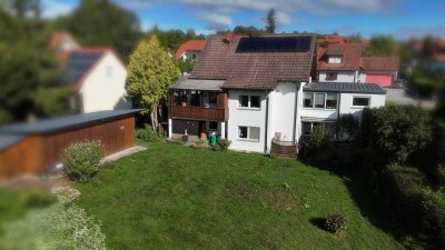 EINFAMILIENWOHNHAUS MIT GARAGE UND GROSSEM GRUNDSTÜCK IN GUTER WOHNLAGE!