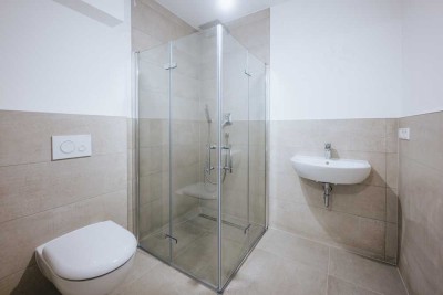 Neubauwohnung mit eigenem Gartenanteil