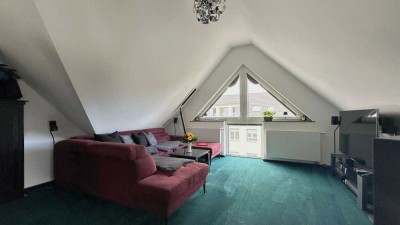 Stilvoll modernisierte Dachgeschosswohnung mit Loggia & Garage im Herzen von Plüderhausen
