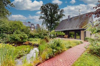 Naturnahes Einfamilienhaus mit großem Garten, Kamin & Einliegerpotenzial in Rheinbach