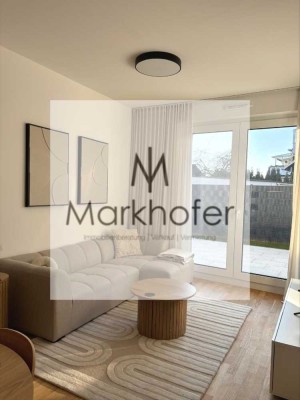 Teilmöbilierte Neubau - Erdgeschoss- Wohnung mit 2 Zimmern und Terrasse zu vermieten !