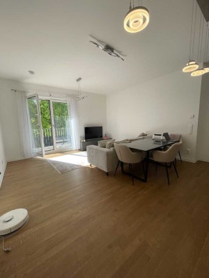 Erstbezug: Hochwertige 2-Zimmer-Wohnung mit Designer-Küche, großem Balkon & Gartenblick