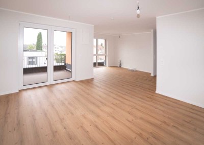 Hochwertige Neubauwohnung mit Dachterrasse und Tiefgaragenplatz im Erstbezug