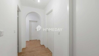Kernsanierte, moderne Erdgeschosswohnung mit eigenem Garten und Terrasse