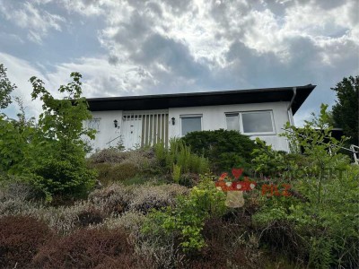 RESERVIERT!!!!Ebenerdiges Wohnen mit Weitblick - Bungalow mit großem Grundstück in Aura im Sinngrund