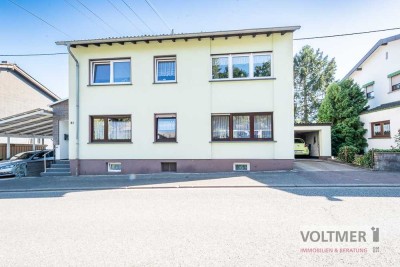 FAMILIÄR - Gepflegtes Ein- bis Zweifamilienhaus mit Garage, Carport und Garten in Schiffweiler!