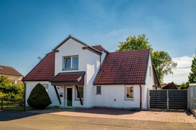 Gemütliches Einfamilienhaus mit weitläufigem Garten und Entwicklungspotenzial