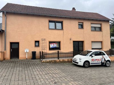 Gemütliches Einfamilienhaus mit Nebengebäude in ruhiger Lage