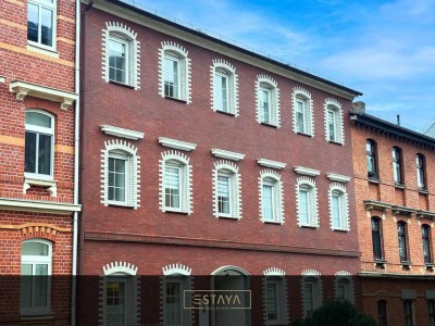 Moderne Eigentumswohnung mit Balkon und eigenem Privatgarten im Innenhof