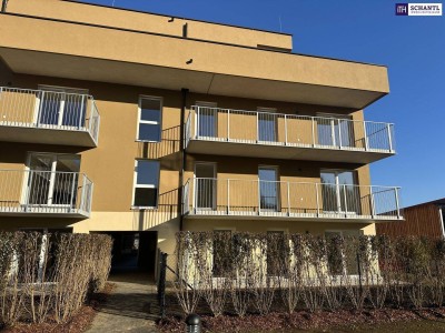 MODERNE Neubauwohnung mit Balkon im 1. Obergeschoss – Erstbezug mit exklusiver Ausstattung, Tischlerküche und Tiefgaragenplatz.