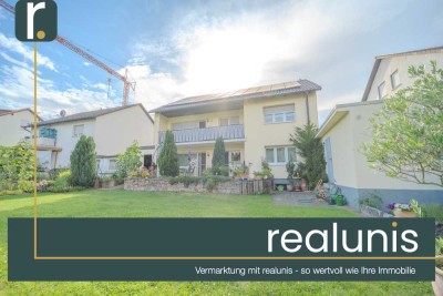 Solides 2-Familienhaus mit Wärmepumpe, PV & Entwicklungspotenzial - realunis