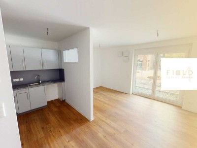 Toll geschnittene 1-Zimmer-Wohnung mit BALKON und EBK im Neubauquartier 'Field 4'