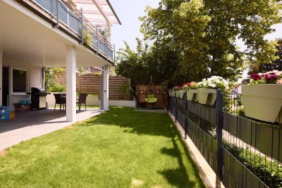 Wohnen mit Gartenidylle: Großzügige 3,5-Zi.-Wohnung mit modernem Flair & separatem Eingang