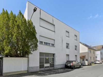 4-Zimmer-Wohnung mit Balkon und Garage – Sanierungsobjekt mit Geschichte in guter Lage von Mühlheim