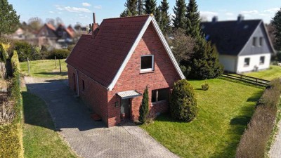 Charmantes Siedlungshaus mit großem Grundstück und Potenzial