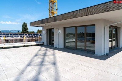 105 m² Dachterrasse für Ihr Leben im Freien – barrierefreie Komfortwohnung mit grünem Energiekonzept