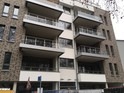 2 Zi-Wohnung zentral, neuwertig, barrierefrei mit EBK, Balkon und TG