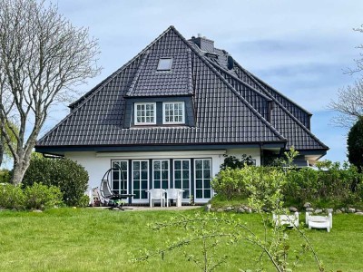 Doppelhaushälfte auf Sylt mit großem Garten und einem Zusatzgrundstück