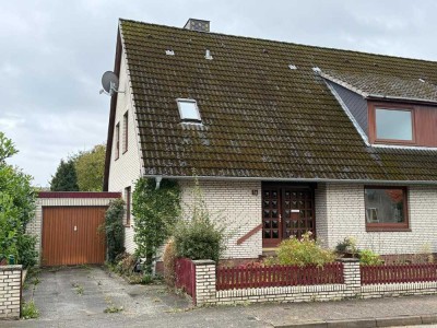 Doppelhaushälfte mit Garage & kleinem Südgarten  (ideal für zwei Generationen -keine abgeschl. Whg.)
