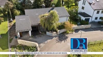 Charmanter Bungalow mit zwei Garagen auf großzügigem Grundstück