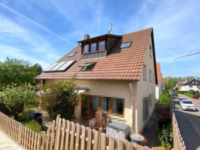 Einladende, helle 6-Zimmer-Maisonettewohnung mit Garage und sonnigem Garten in zentraler Lage