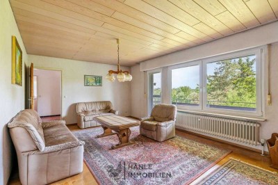 Potenzialreiches Einfamilienhaus mit möglicher Einliegerwohnung und traumhaftem Garten zu verkaufen!