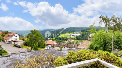 Charmante 2-Zimmer-Terrassenwohnung mit Weitblick, Südbalkon & TG-Stellplatz