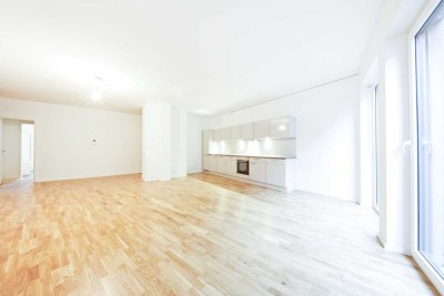 Stilvolle Erdgeschosswohnung mit großzügiger Terrasse und moderner Markenküche in eleganter Atmosphä
