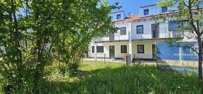 Erstbezug 3-Zimmer-Wohnung mit gehobener Innenausstattung mit Terrasse/Garten und EBK in LA-West