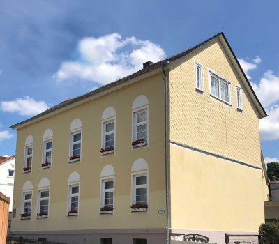 Wohn- und Geschäftshaus mit viel Entwicklungspotenzial in zentraler Lage