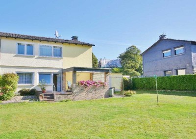 Attraktive Ein-Zweifamiliendoppelhaushälfte auf großem Grundstück in ruhiger Lage von Haan-Gruiten