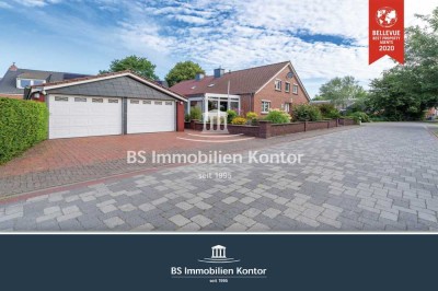 Uttum! Renovierte, gepflegte Doppelhaushälfte mit Garage, Gartenanlage und Wintergarten!