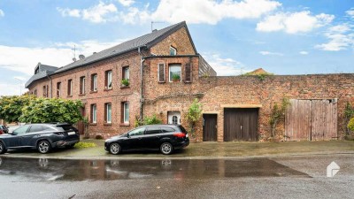 Teilvermietetes Mehrfamilienhaus mit 3 WE, sonniger Terrasse und Ausbaupotenzial in ruhiger Lage